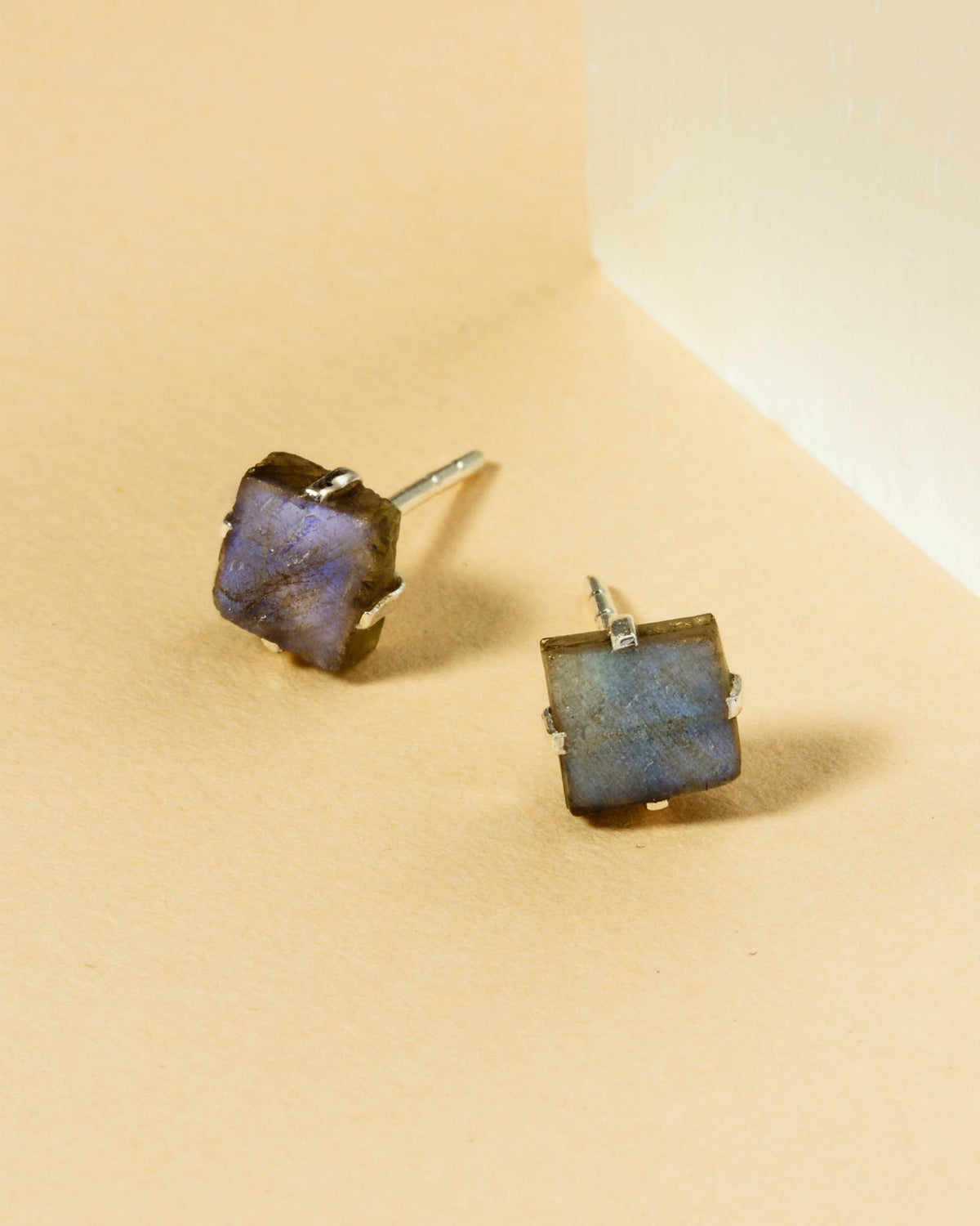 Sterling silver post earrings with square Labradorite gemstones.