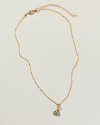 Full view of dalmatisn jasper pendant necklace showing pendant, chain, and closure