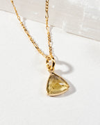 Detail of triangular citrine pendant necklace