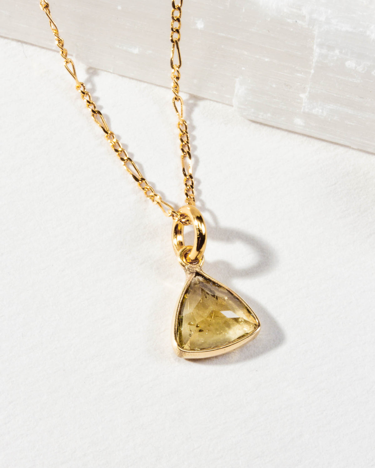 Detail of triangular citrine pendant necklace