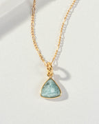 Detail of triangular aquamarine pendant necklace