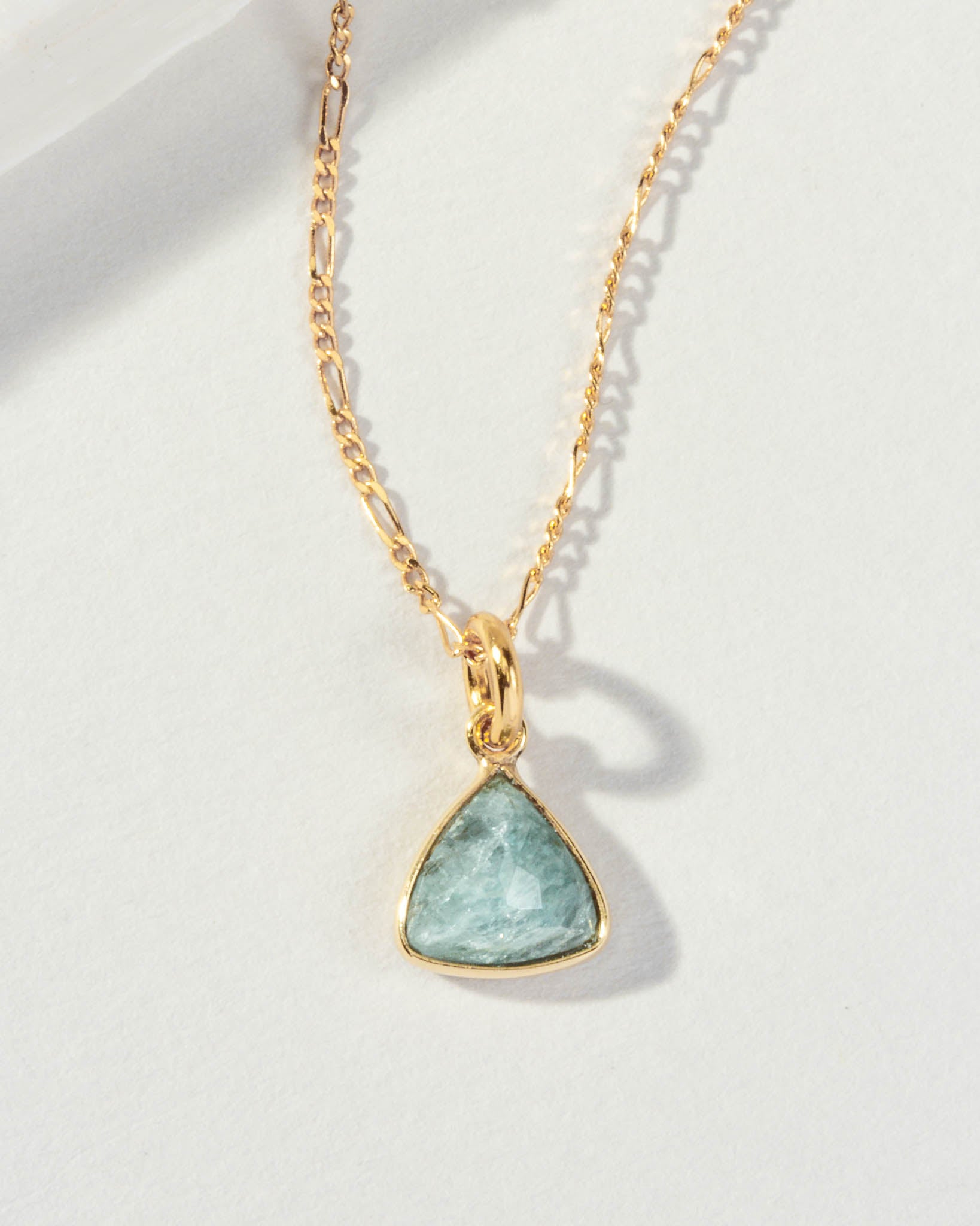 Detail of triangular aquamarine pendant necklace