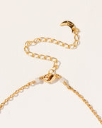Close-up of the Yin and Yang necklace clasp and chain extender.