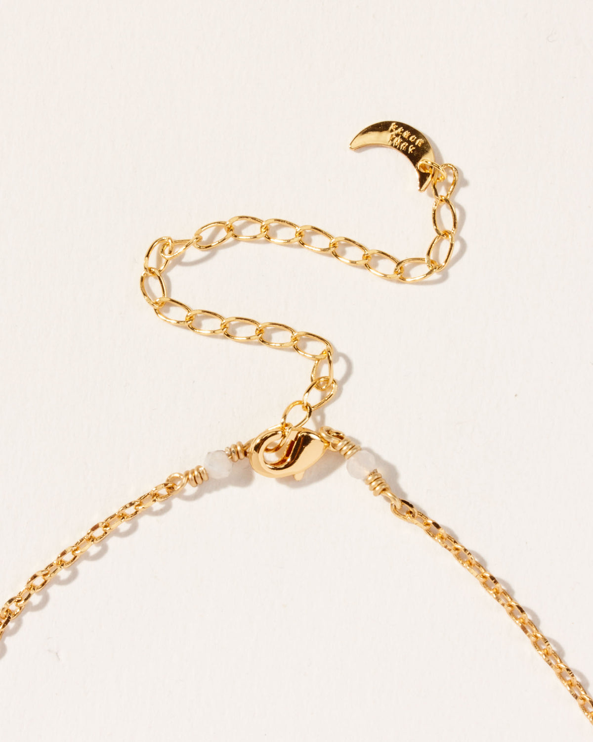 Close-up of the Yin and Yang necklace clasp and chain extender.