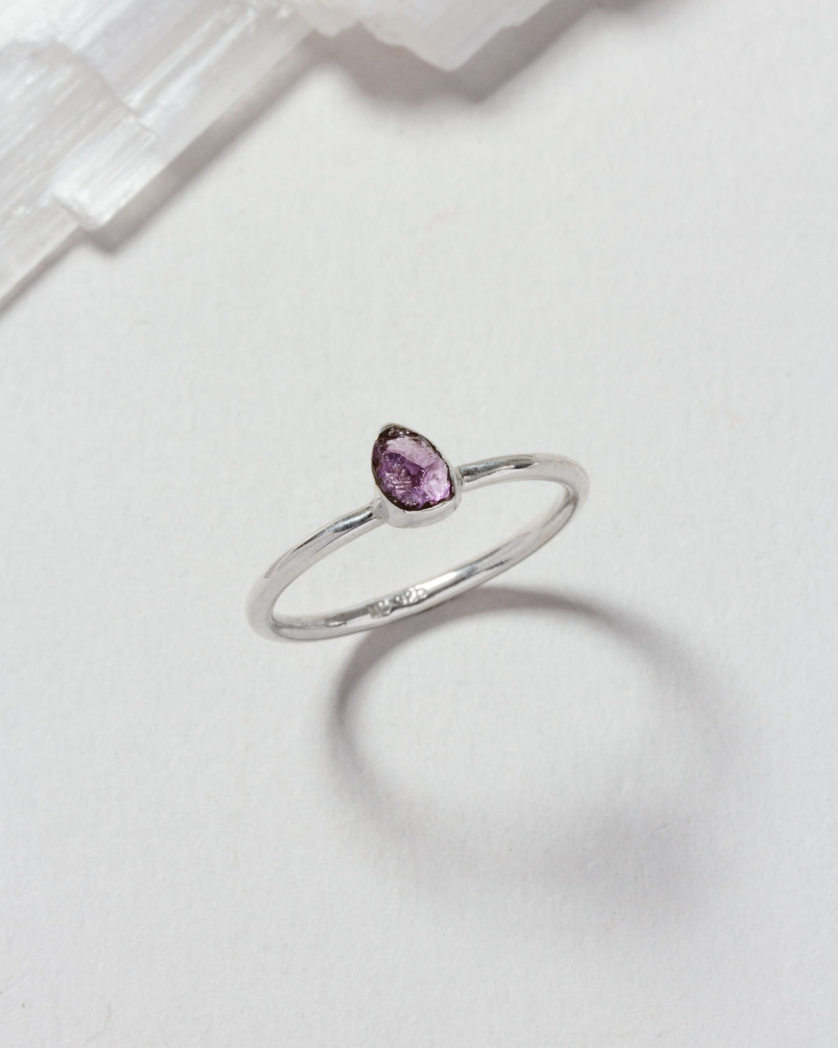 Sterling silver ring with a teardrop-shaped Amethyst stone.