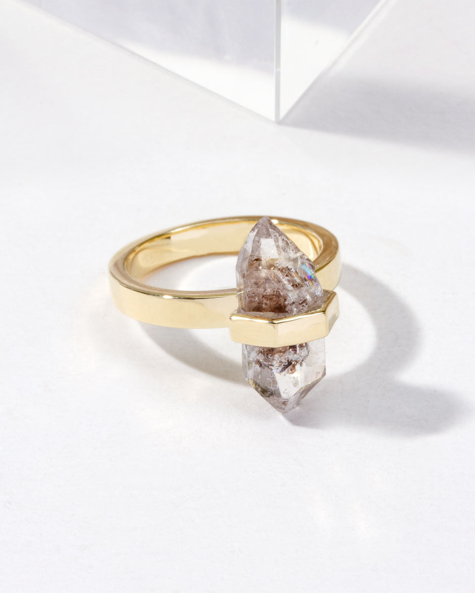 The Loud and Clear Ring with a Herkimer Quartz crystal on a 14KT gold plated sterling silver band.