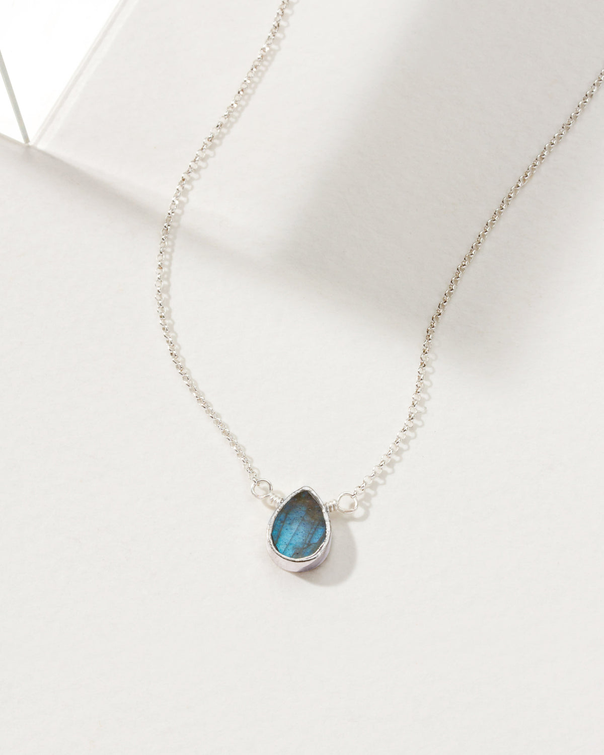 Silver Plated Brass necklace with blue Labradorite gemstone pendant.