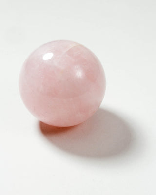 A pink rose quartz sphere curio by Luna Norte Jewelry.