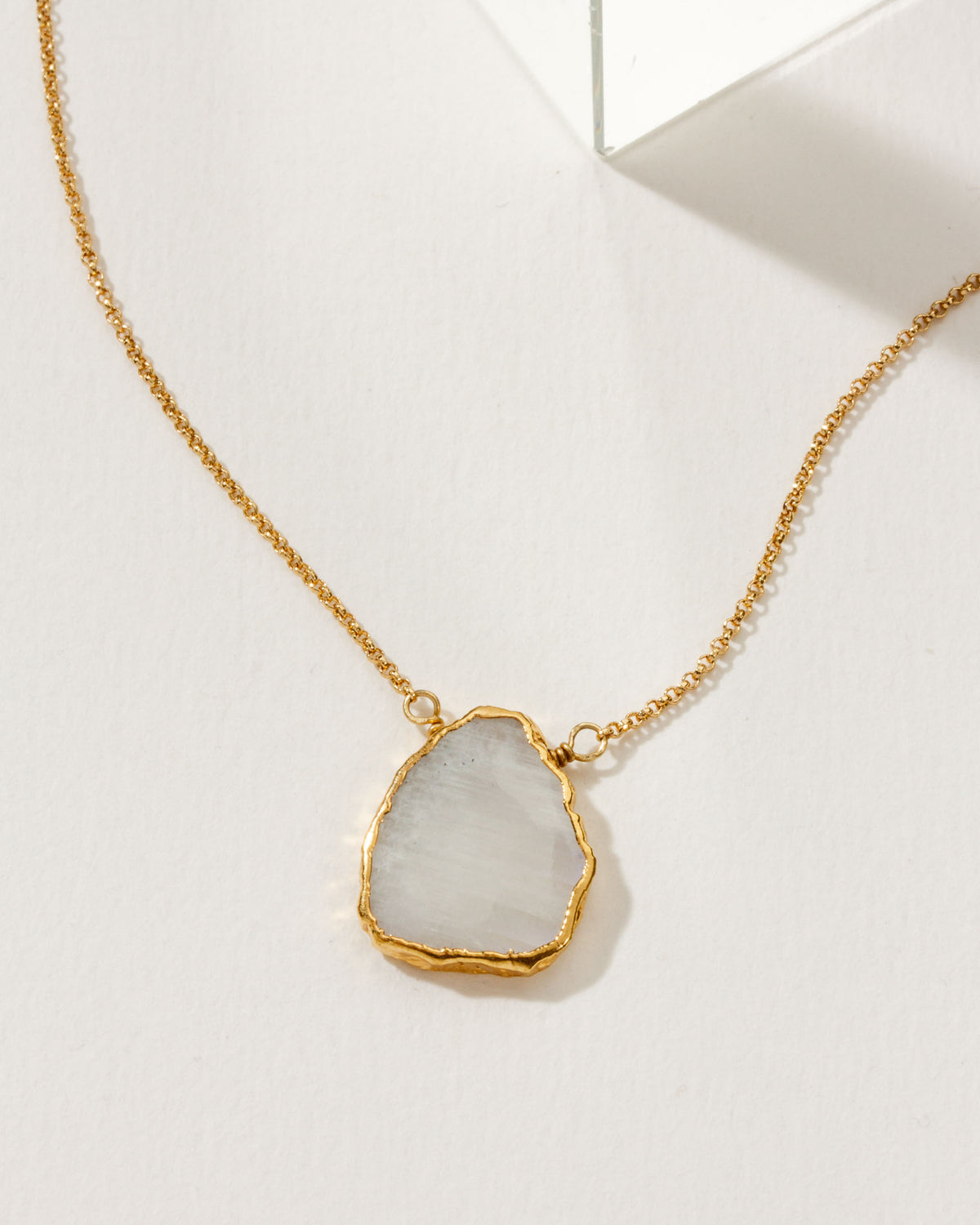 Moonstone Earth, Wind, and Fire Necklace with gold plated chain.