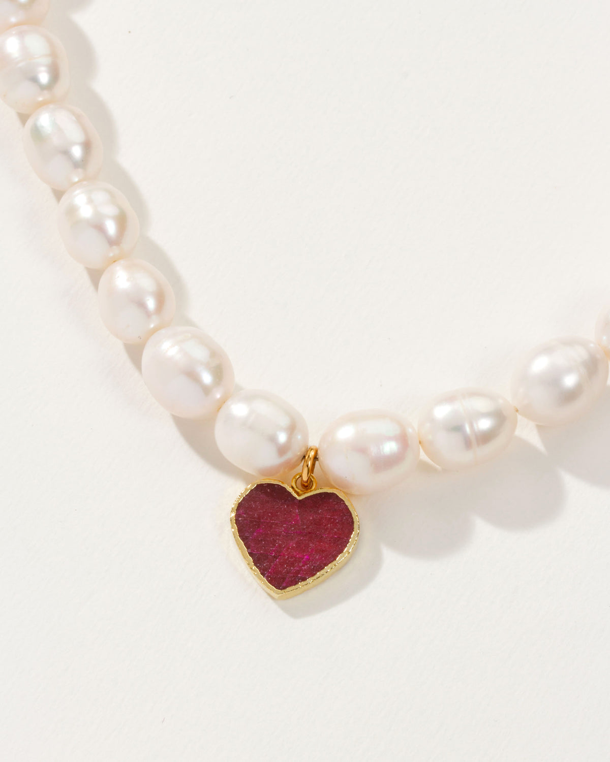 Royal Necklace with pearls and a Ruby heart pendant.