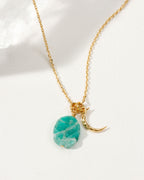 Gold necklace with crescent moon and Amazonite gemstone.
