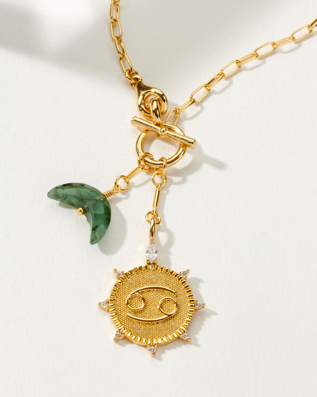 Cancer Zodiac symbol gold plated toggle necklace with Emerald crescent moon by Luna Norte