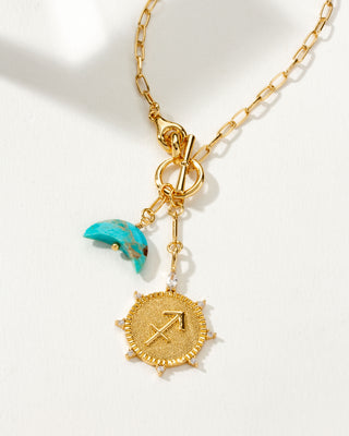 Sagittarius Zodiac symbol gold plated toggle necklace with turquoise crescent moon by Luna Norte