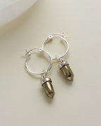 Silver "On Point Mini Hoops" earrings with dangling Pyrite stone pendants.