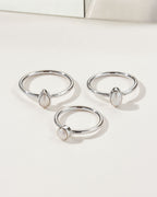 Three Sand to Stone Freshwater Pearl Rings: Teardrop, Oval and Round.