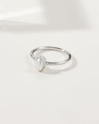 Sand to Stone ring with an oval freshwater pearl on a silver band.