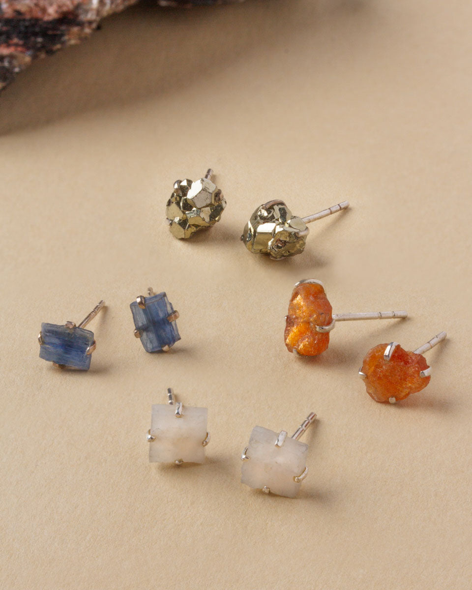 Raw Beauty Post Earrings in sterling silver: Pyrite, Kyanite, and Sunstone gemstones are displayed.