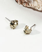 Sterling silver post earrings with a raw Pyrite gemstone.