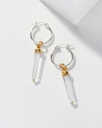 Pair of silver Rayanne Interchangeable Hoops with clear crystal pendants and gold accents are