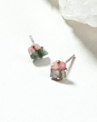 Tourmaline Raw Beauty Birthstone Post Earrings on a white tabletop